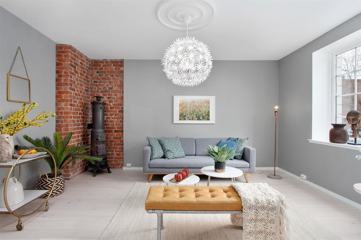 Koselig stue med peis og rosett. Galleribilde