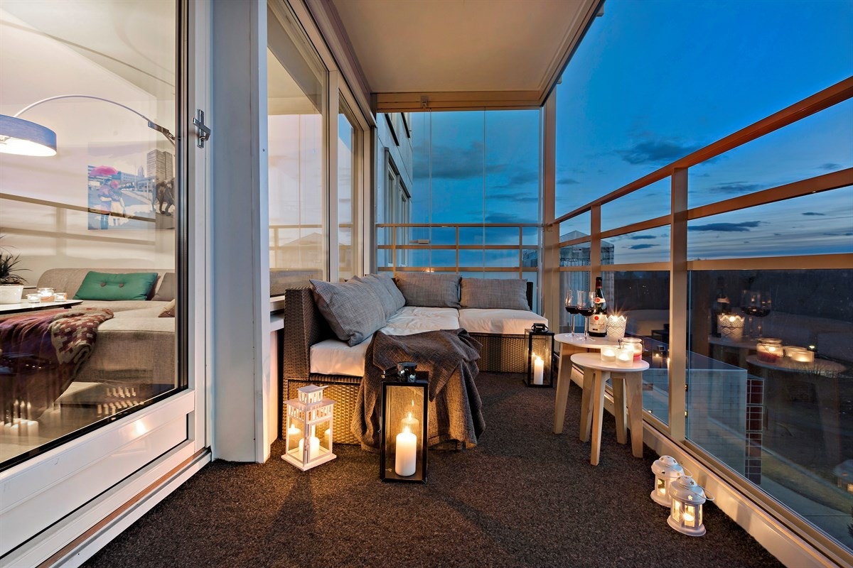 Med en innglasset veranda har du en utvidelse av stuen, hvor du kan nyte sene sommer - og høstkvelder Galleribilde