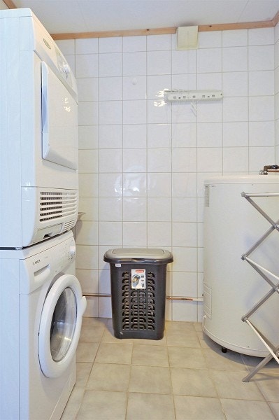 Felles vaskerom med vaskemaskin og tørketrommel Galleribilde
