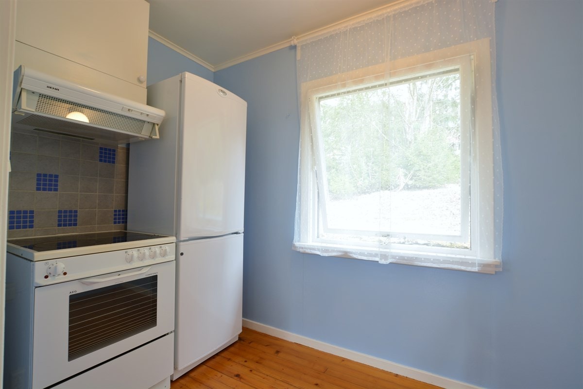 Separat kjøkkendel med komfyrplass. Galleribilde