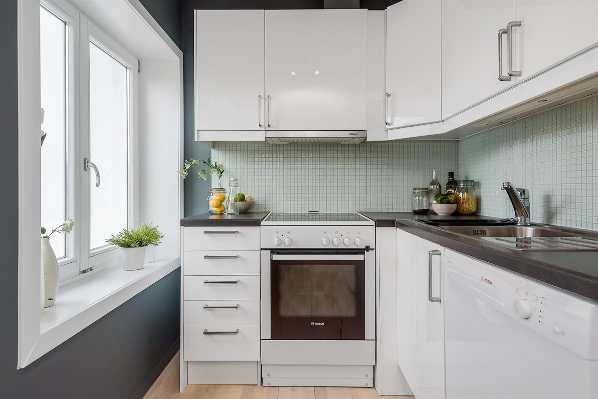 Delvis åpen kjøkkenløsning fra rehabiliteringsåret 2007. Galleribilde