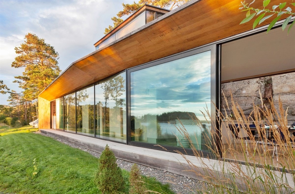 Link til arkitektens presentasjon av hytten ligger under avsnitt bebyggelse Galleribilde