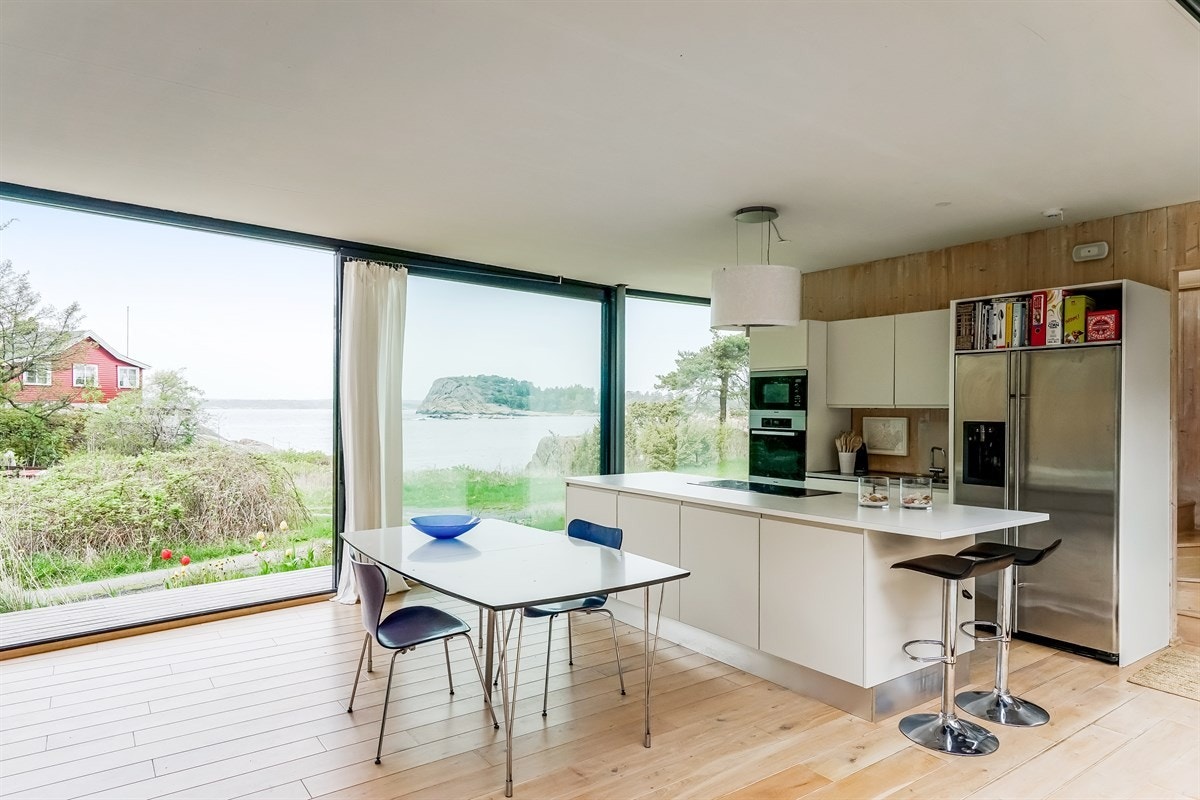 Stue/spisestue med åpen kjøkkenløsning Galleribilde