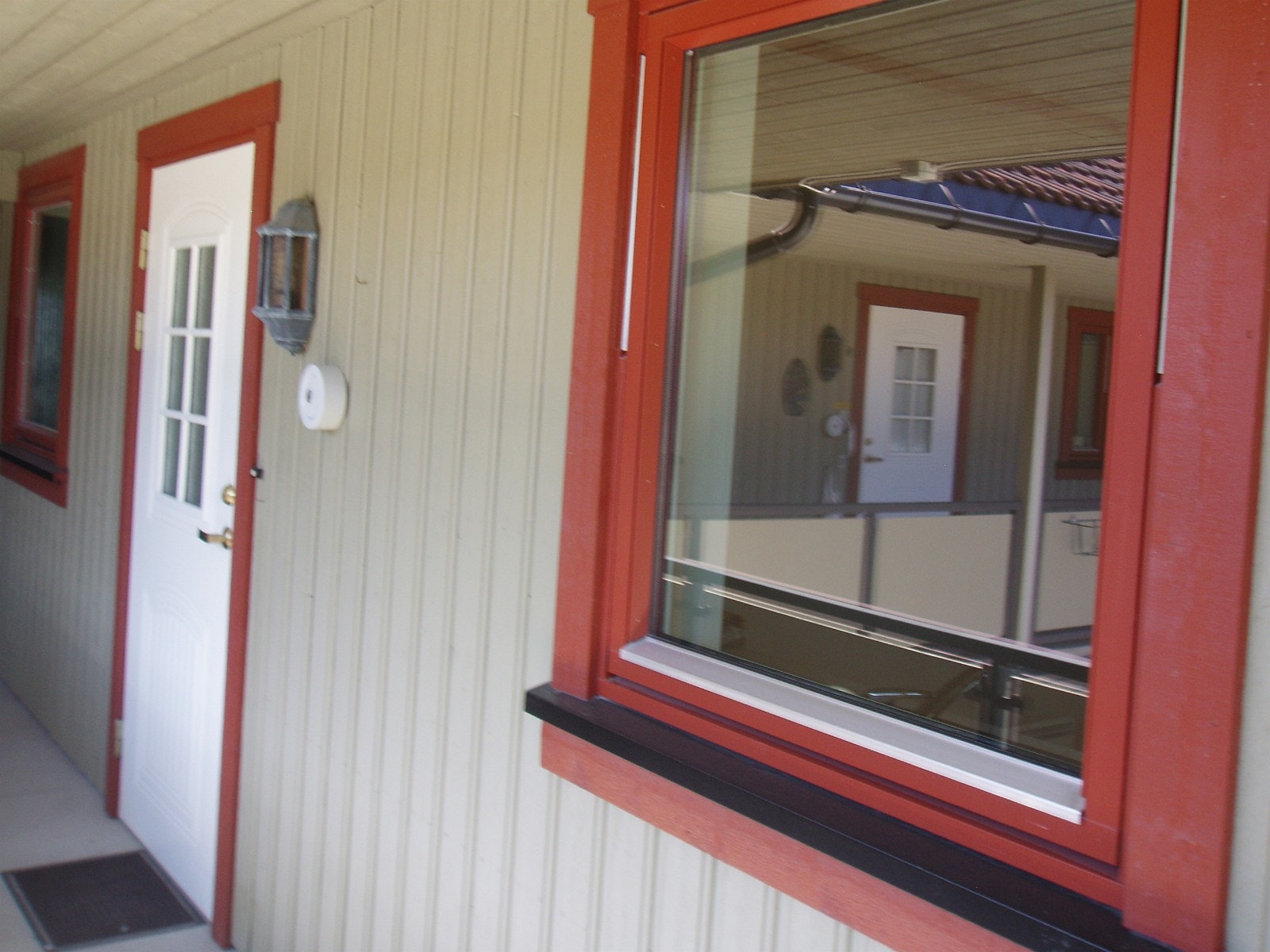 Inngang fra svalgangen Galleribilde