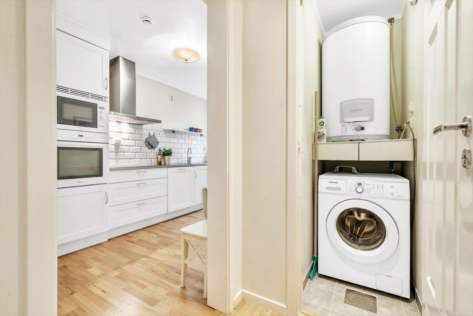 Eget lite kott til vaskemaskin frigjør plass på badet. Galleribilde