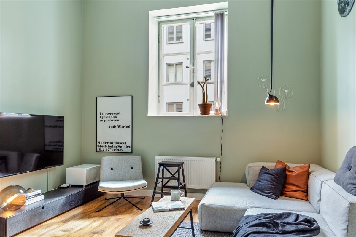 Delikat fargevalg og detaljer preger stuen Galleribilde