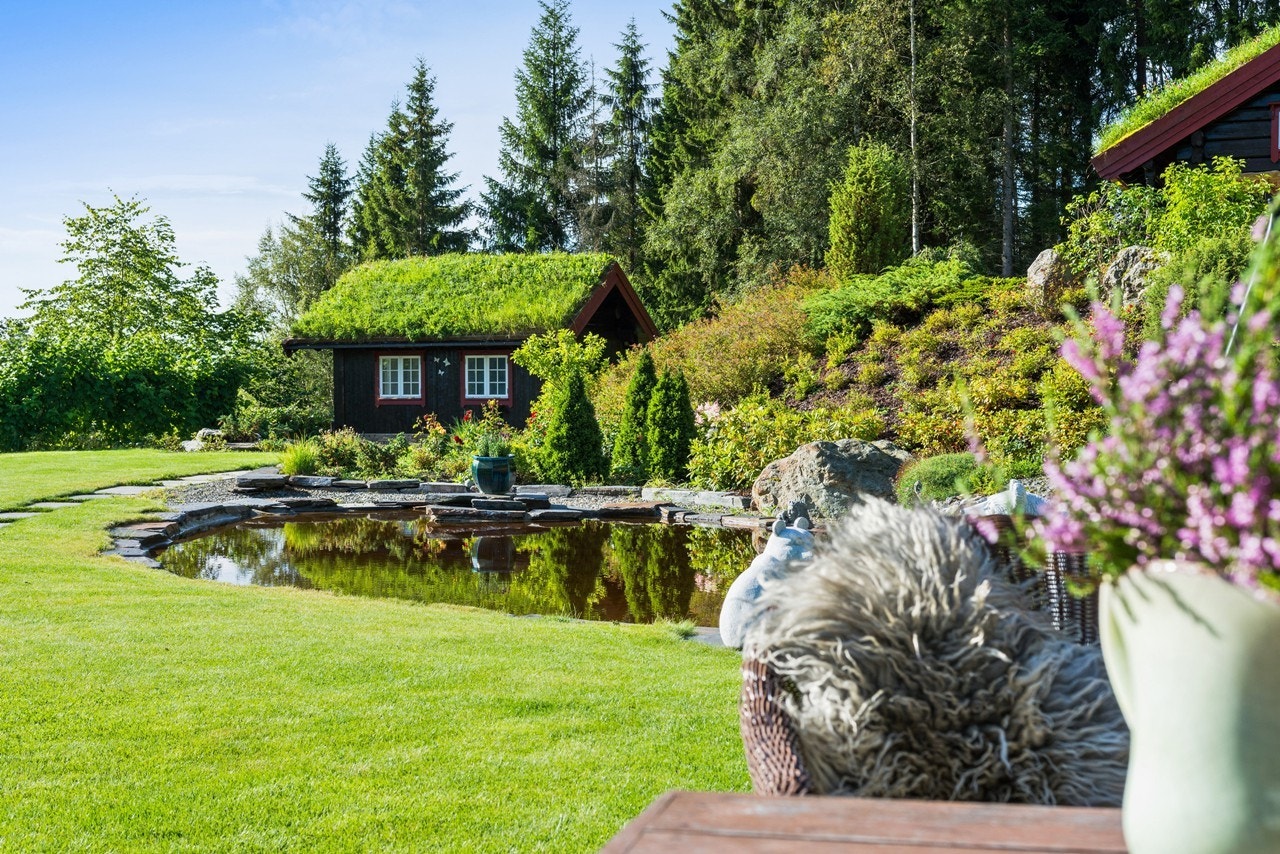 Eget vannspeil er et møst i denne praktfulle hagen Galleribilde