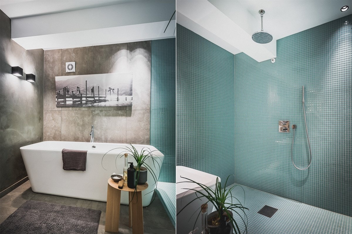 Et frittstående badekar og en åpen dusjsone byr på valgfrihet, mens duplisert servant åpner for samtidig bruk av dette badet. Galleribilde