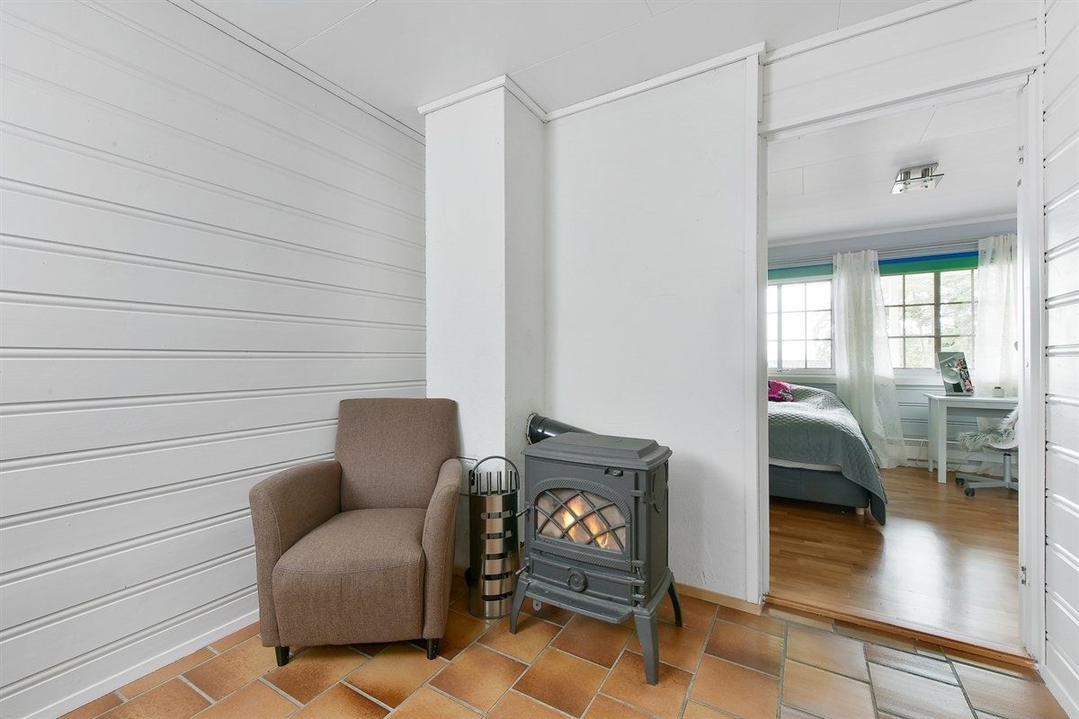 Soverom 4 har peis på rommet. Galleribilde