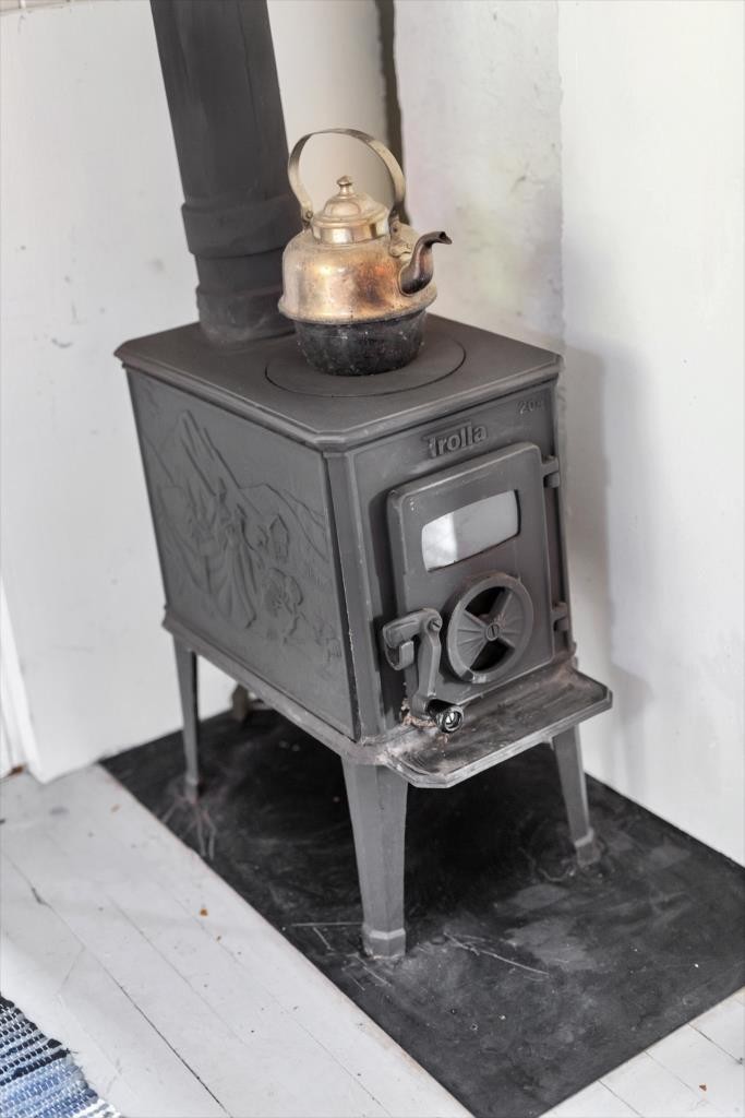 Vedfyring på kjøkken Galleribilde