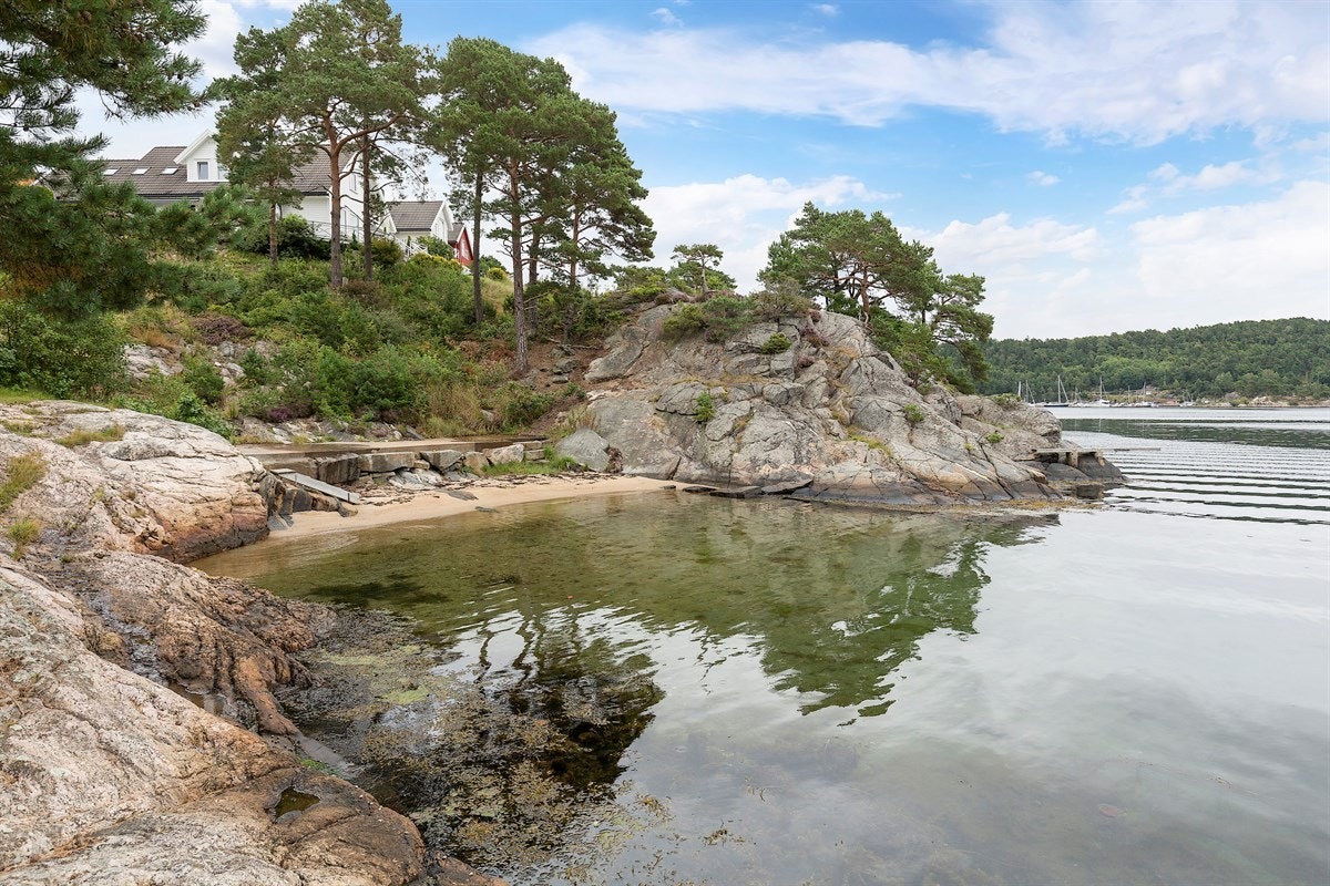 Sandstrand like ved boligen Galleribilde