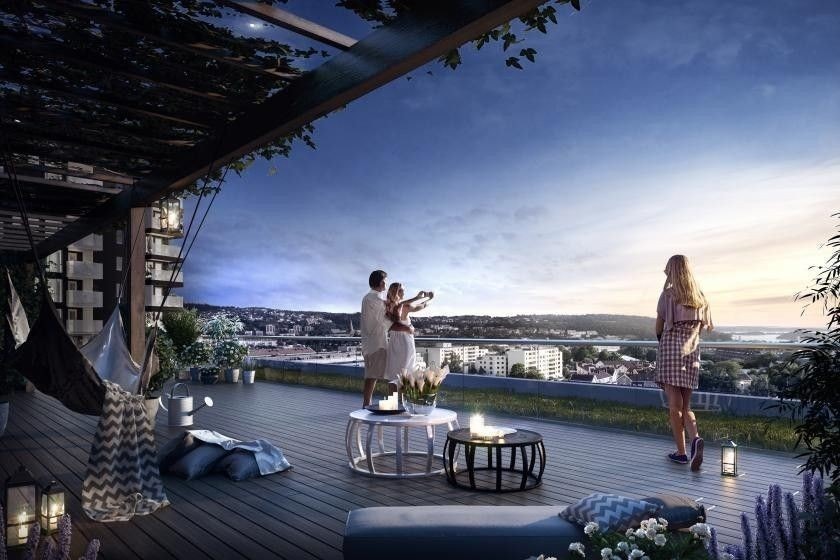 Det er en felles takterasse i bygget med fantastisk utsikt mot byen Galleribilde