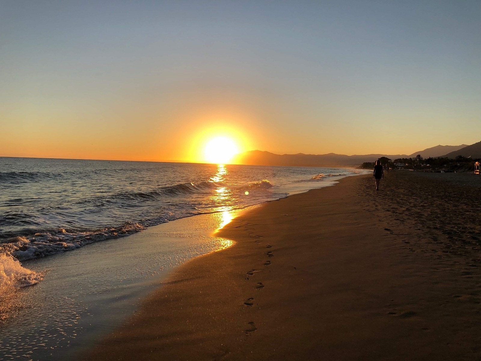 Solnedgang på stranden Galleribilde