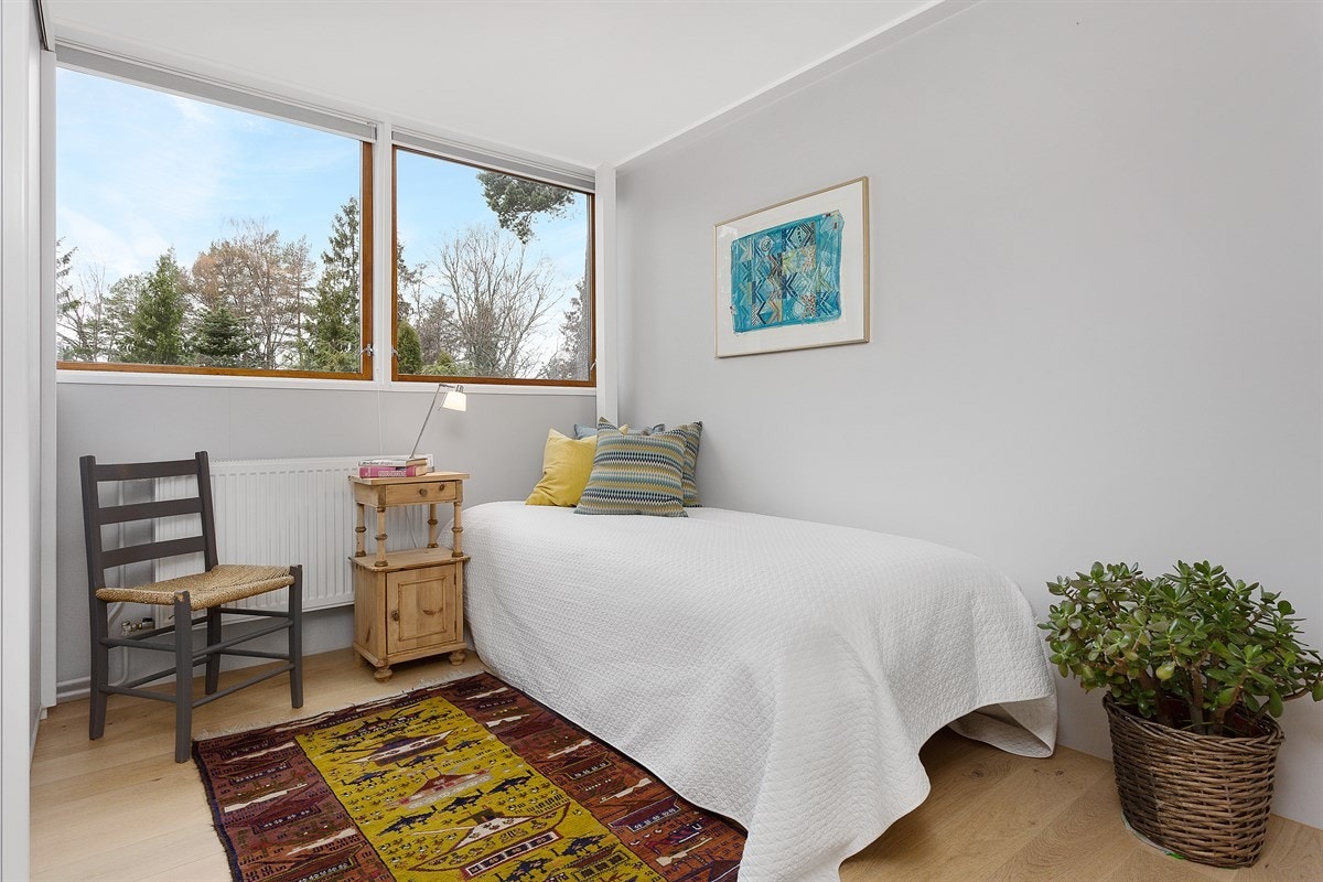 Soverommene har samme luftige og lyse stil som resten av boligen. Galleribilde