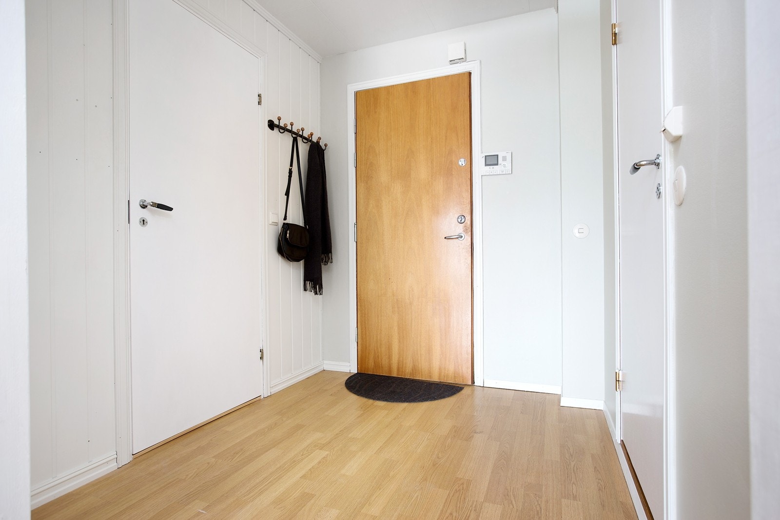 Innbydende inngangsparti til leiligheten Galleribilde