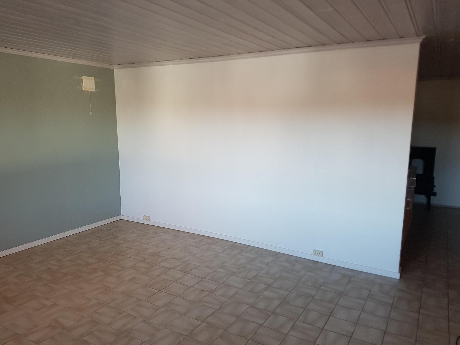 Stue sett innover i leiligheten Galleribilde