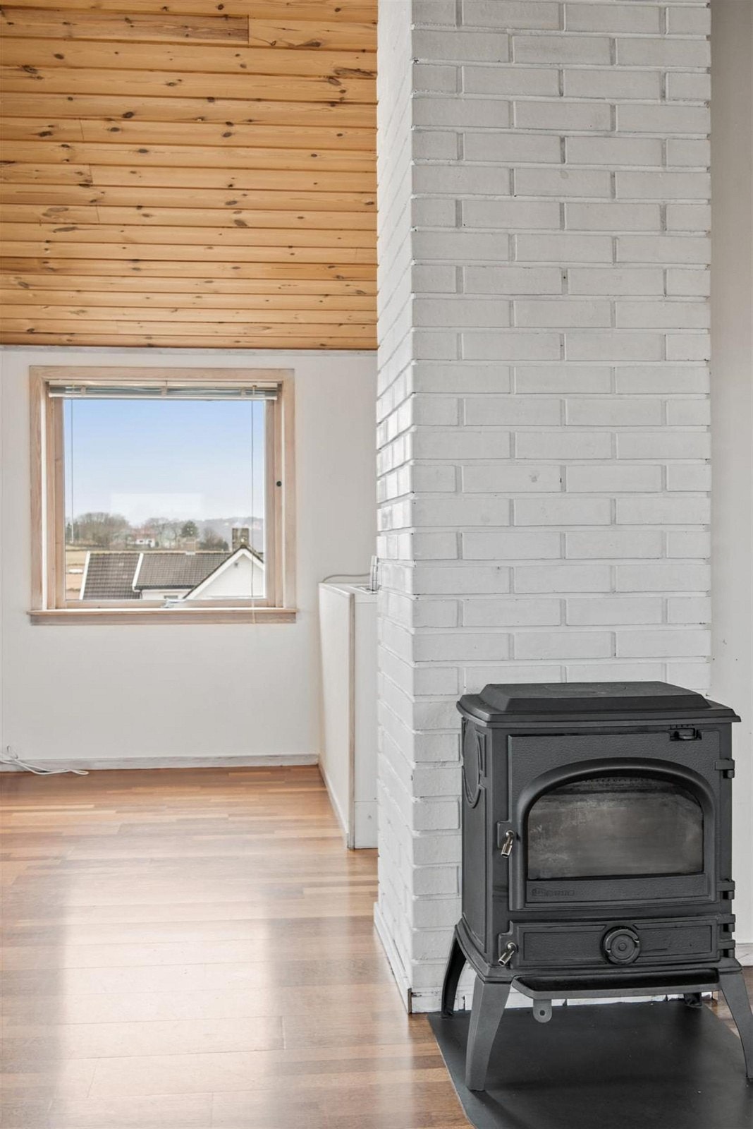 Vedovn i stuen. Galleribilde