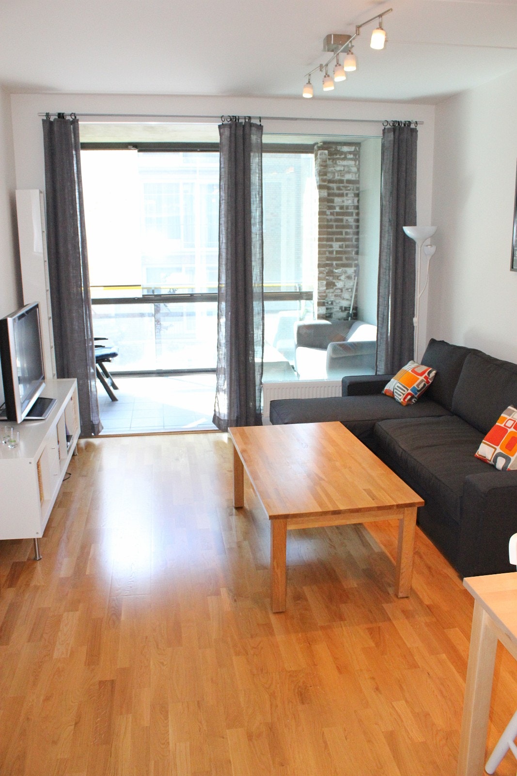 Stue og innglasset balkong Galleribilde