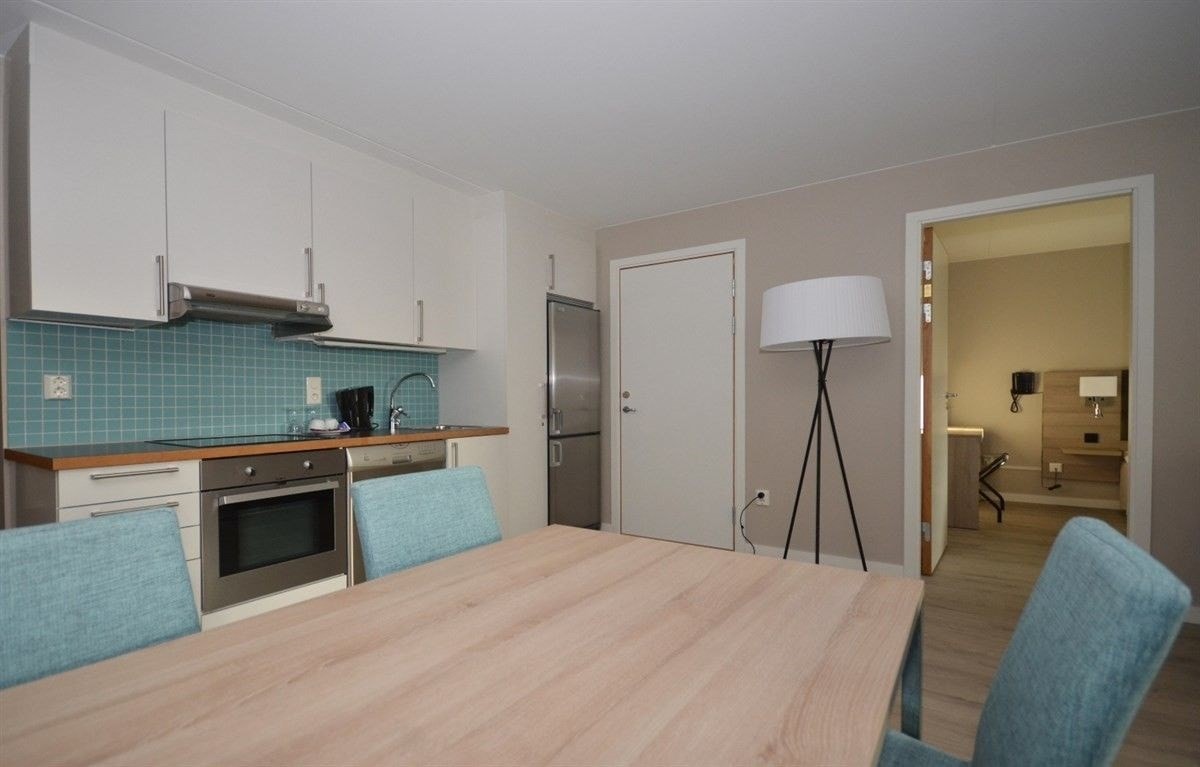 Kjøkkenet i denne leiligheten Galleribilde