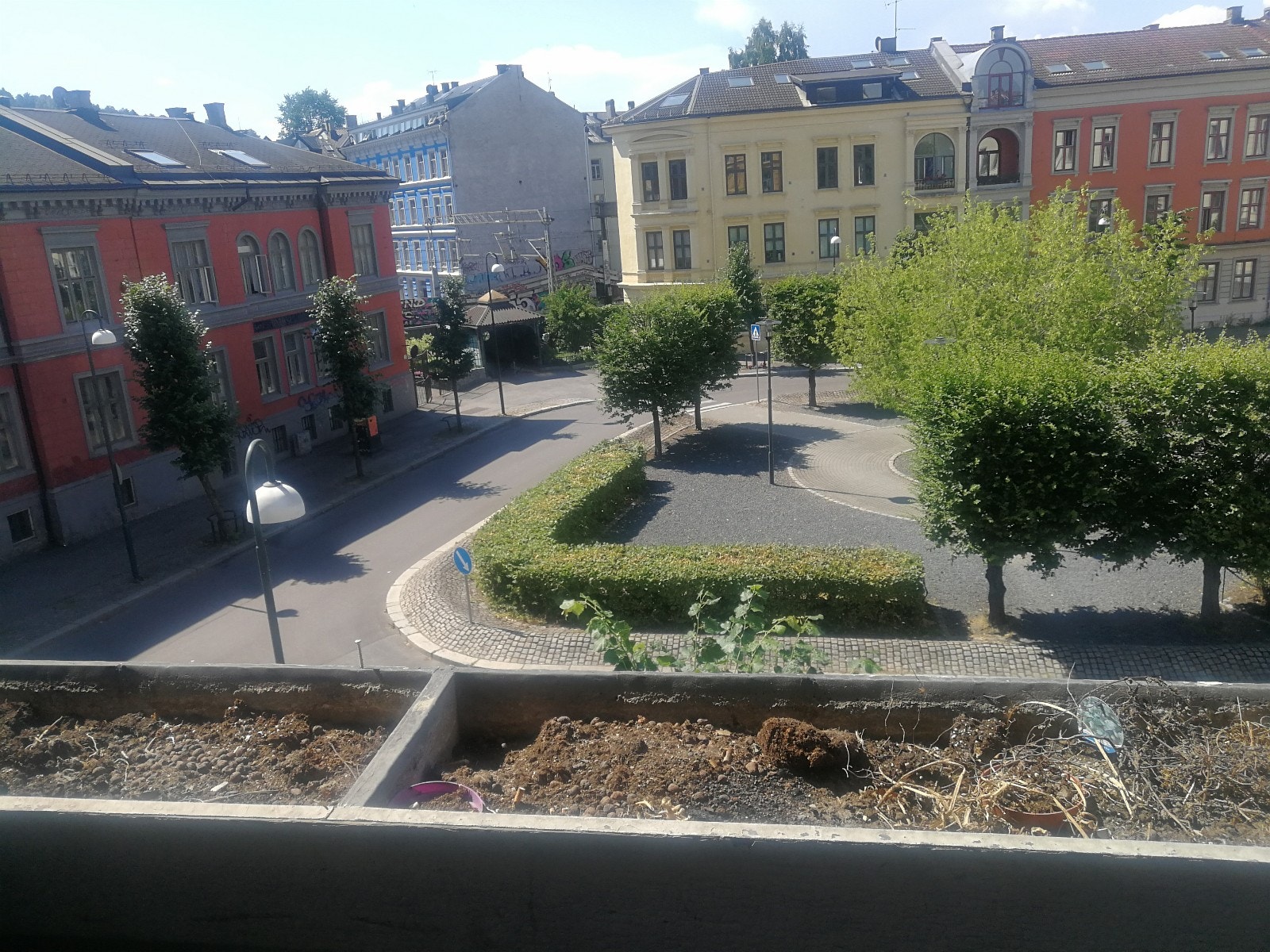 Utsikt fra overbygd veranda. Harald Hårdrådes Plass Galleribilde