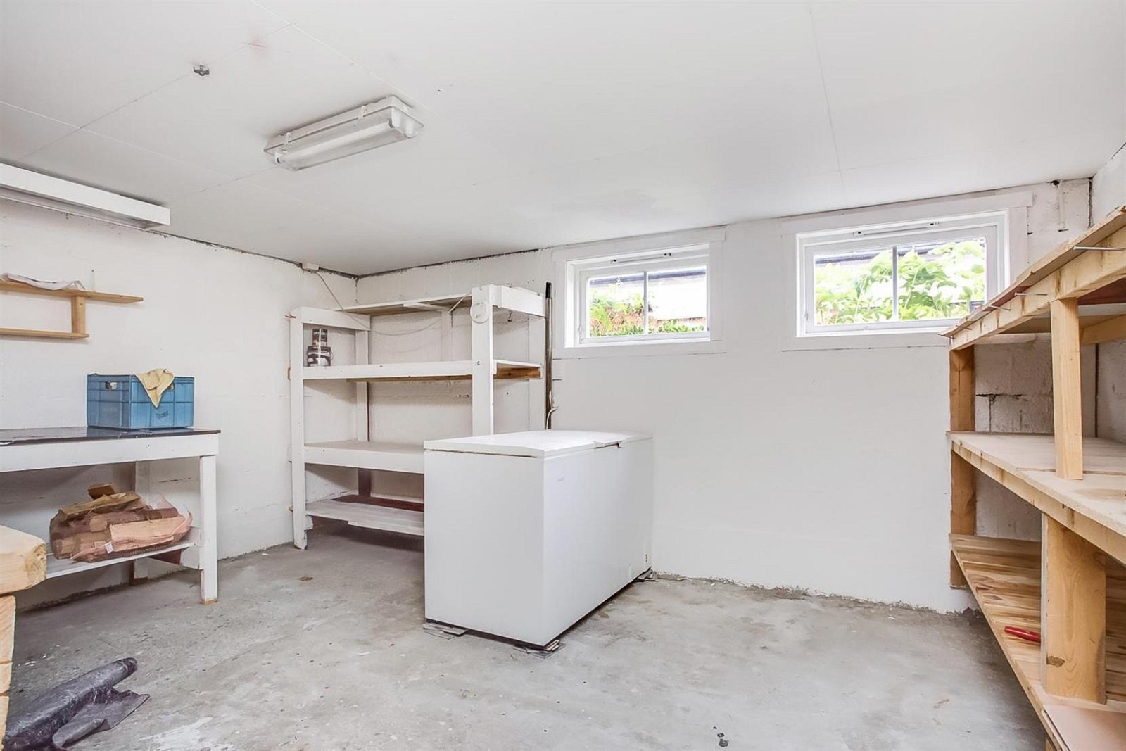 Kjelleren har verksted, vaskerom og flere boder. Galleribilde