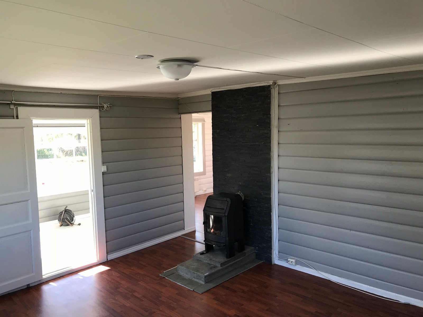 Stue1 med vedovn Galleribilde