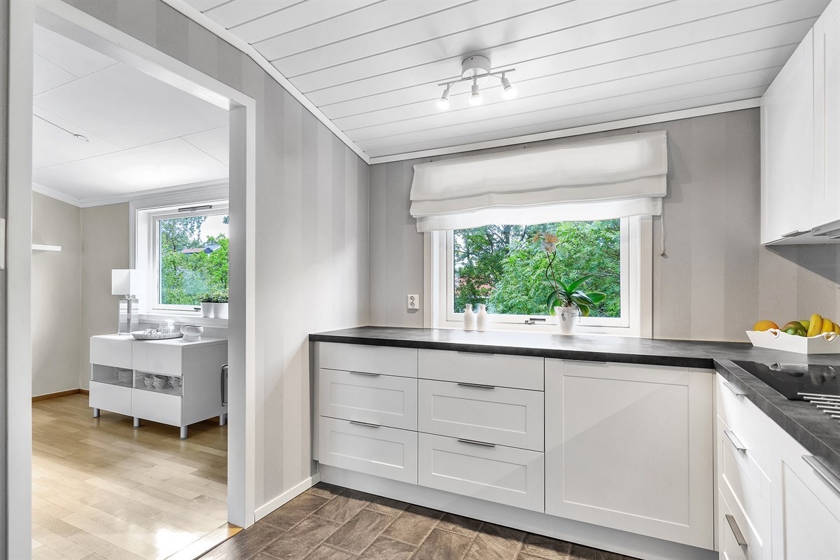 Vågsbygd / Auglandsbukta - Innholdsrikt rekkehus med sentral beliggenhet. Garasje. Fin standard - Exbo v/eiendomsmegler Terje Skaara Galleribilde