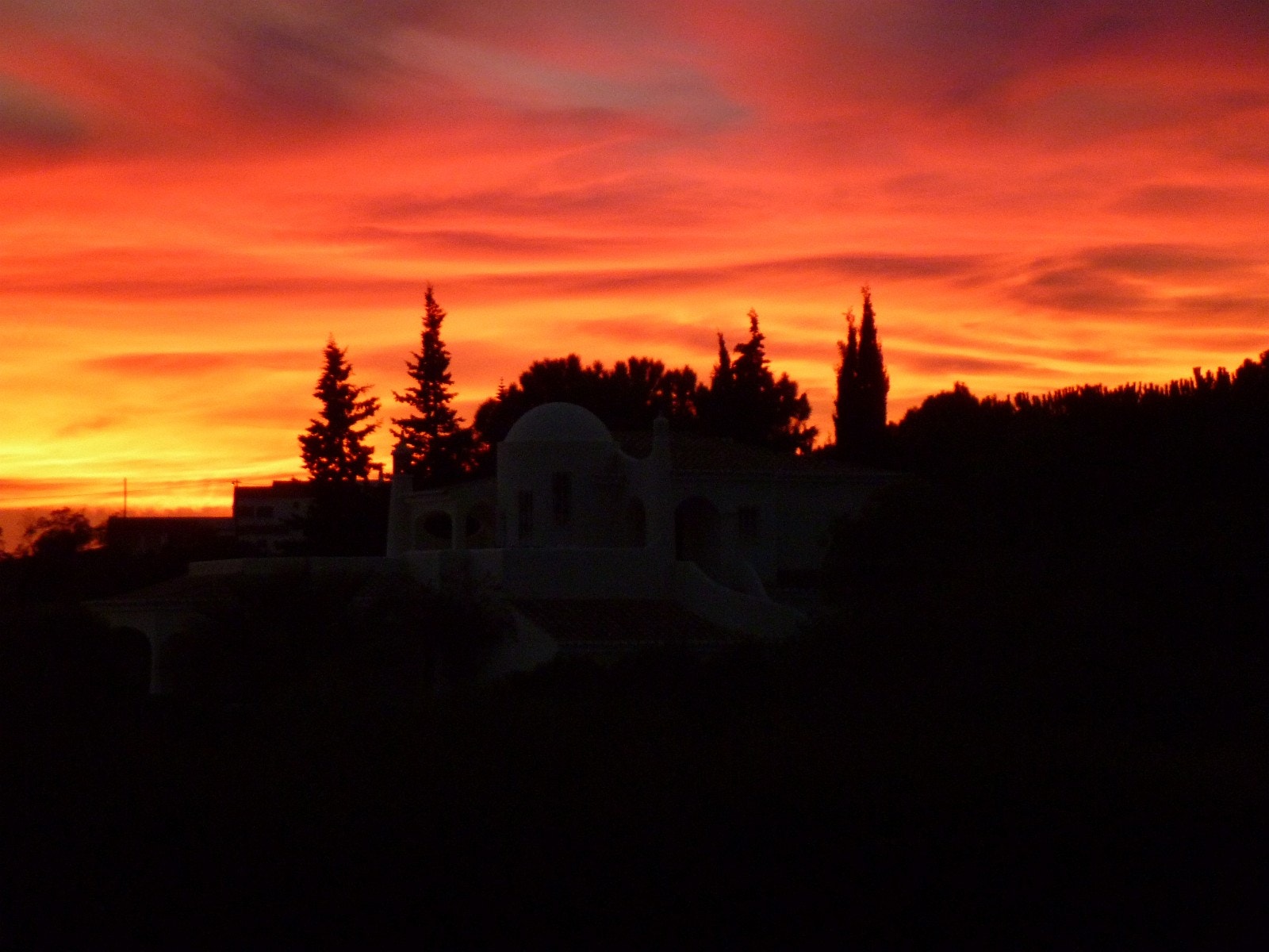 Casa Joia i solnedgang. Galleribilde