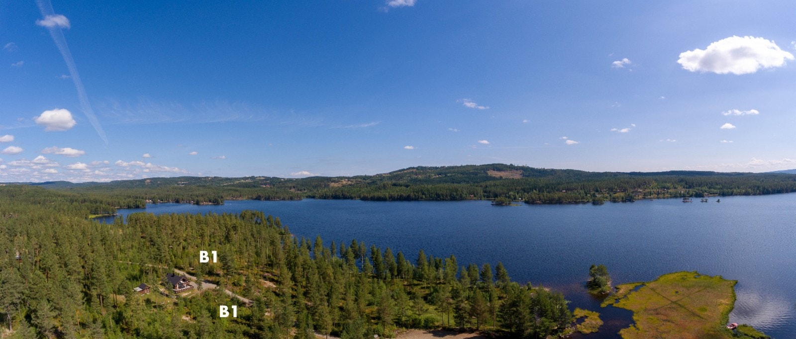 Fortsatt utsikt mot nord med fokus på et av tre tomteområder i Vassendmoen, B1 Galleribilde