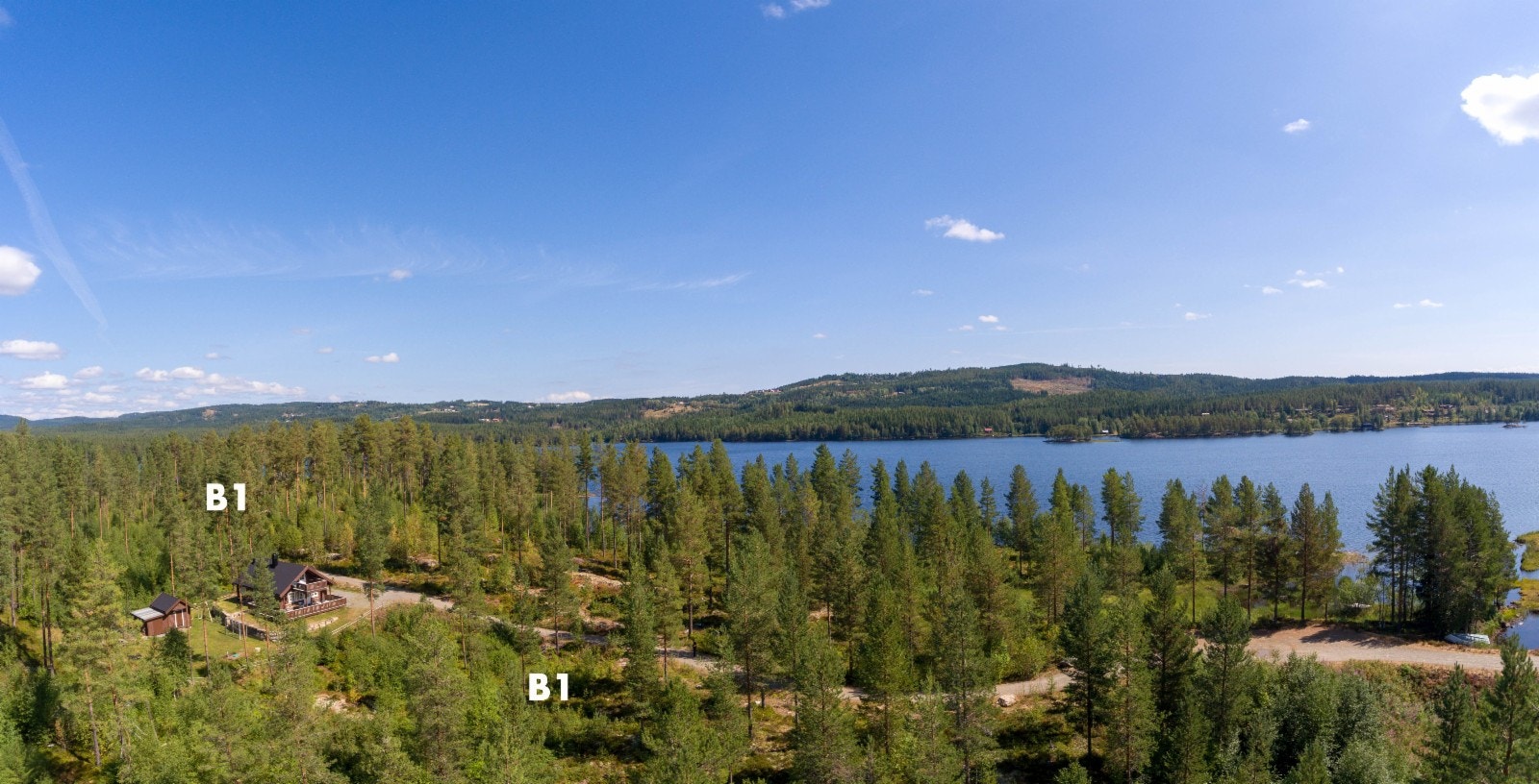 Fortsatt utsikt mot nord med fokus på et av tre tomteområder i Vassendmoen, B1 Galleribilde