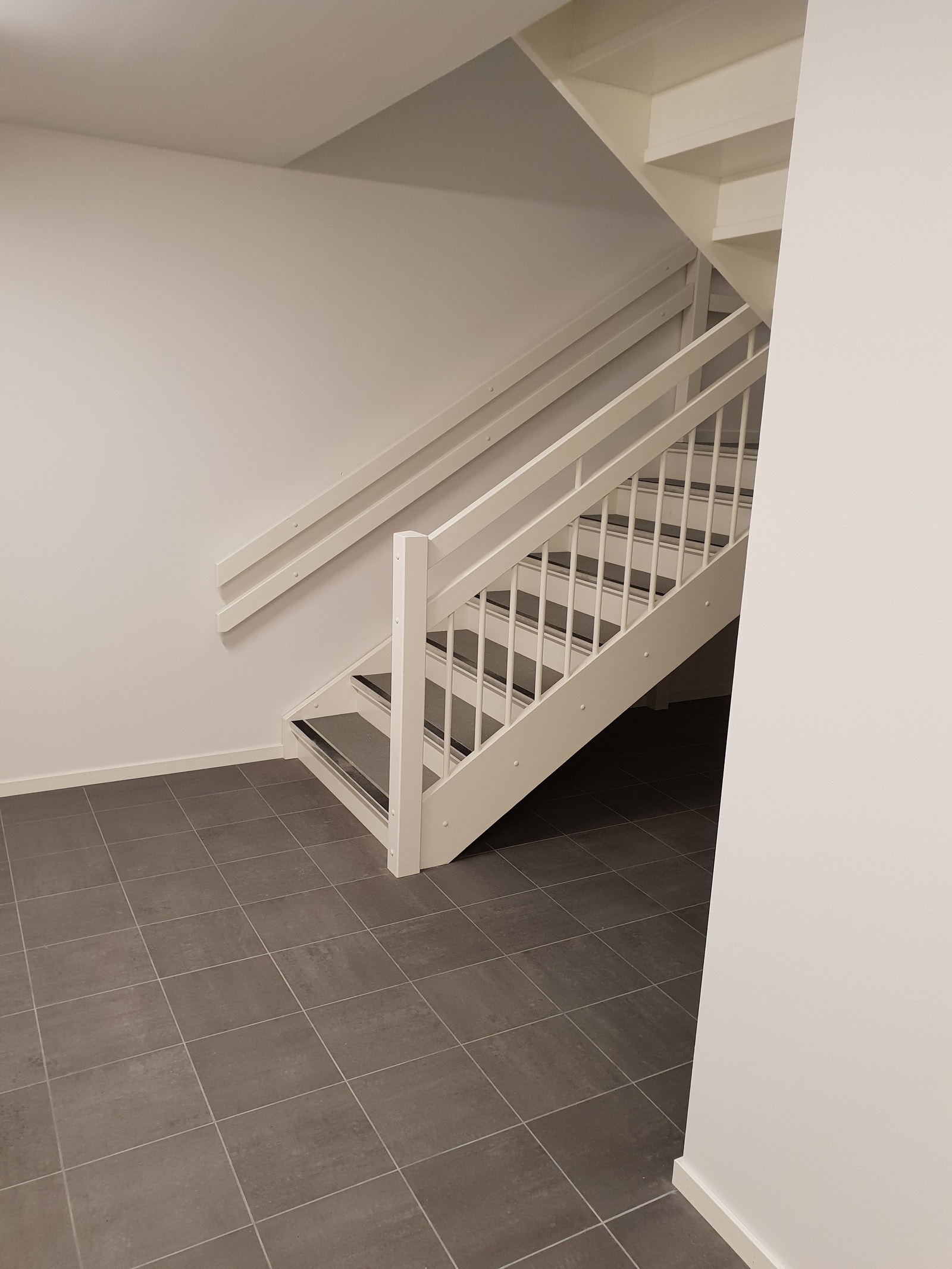 Trapp opp fra Parkering Galleribilde