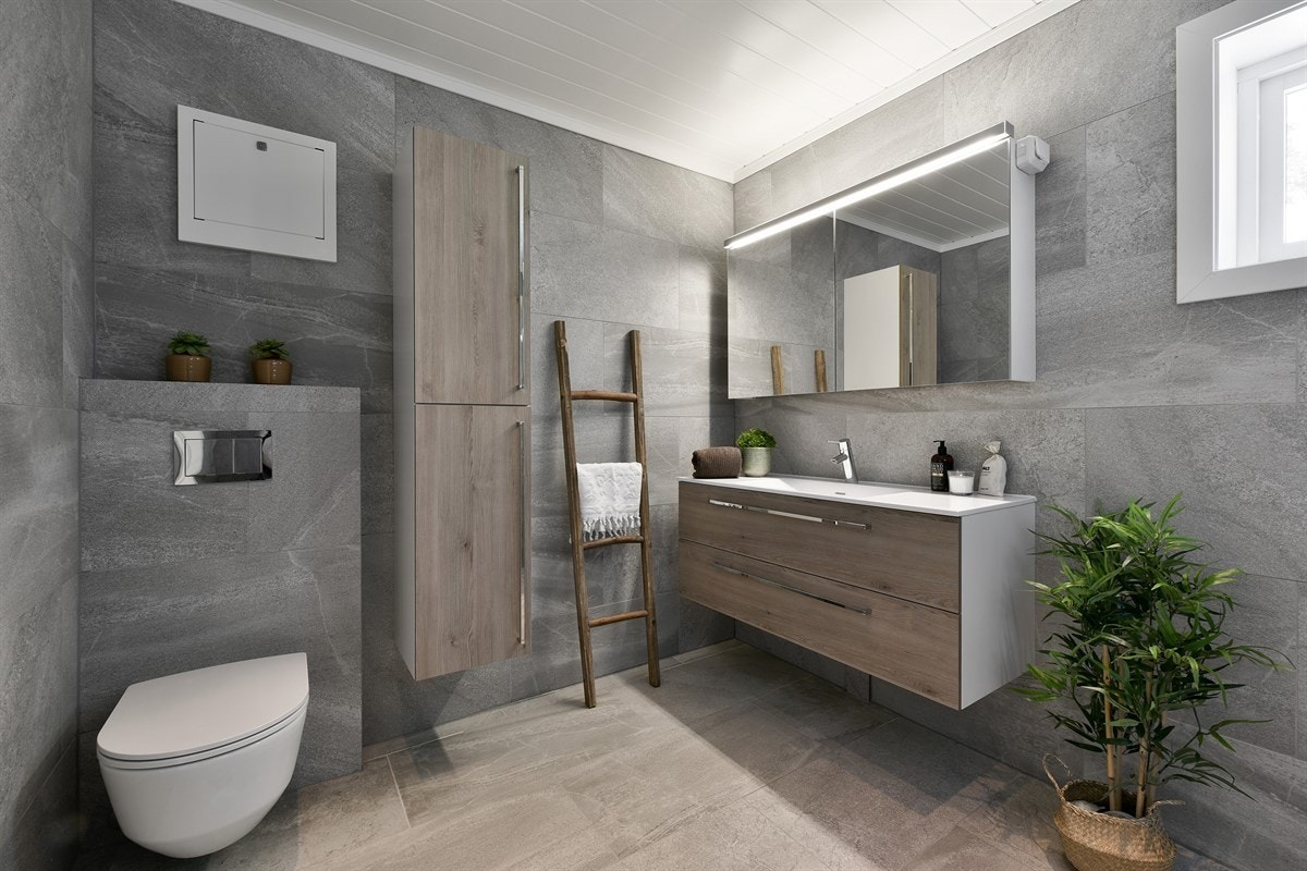 Rommet har downlights, gulvvarme og helflisede overflater med et naturlig utseende. Galleribilde