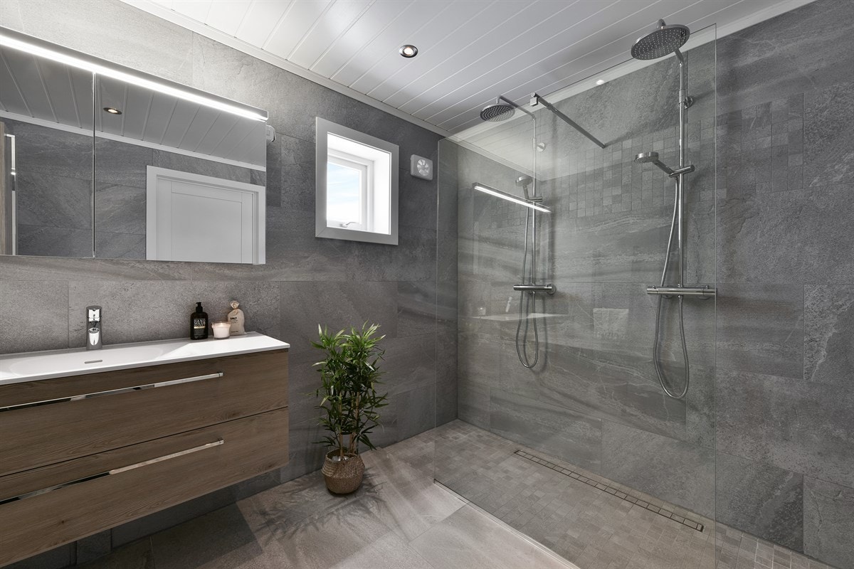 Boligen har et lekkert bad og et separat vaskerom. Galleribilde