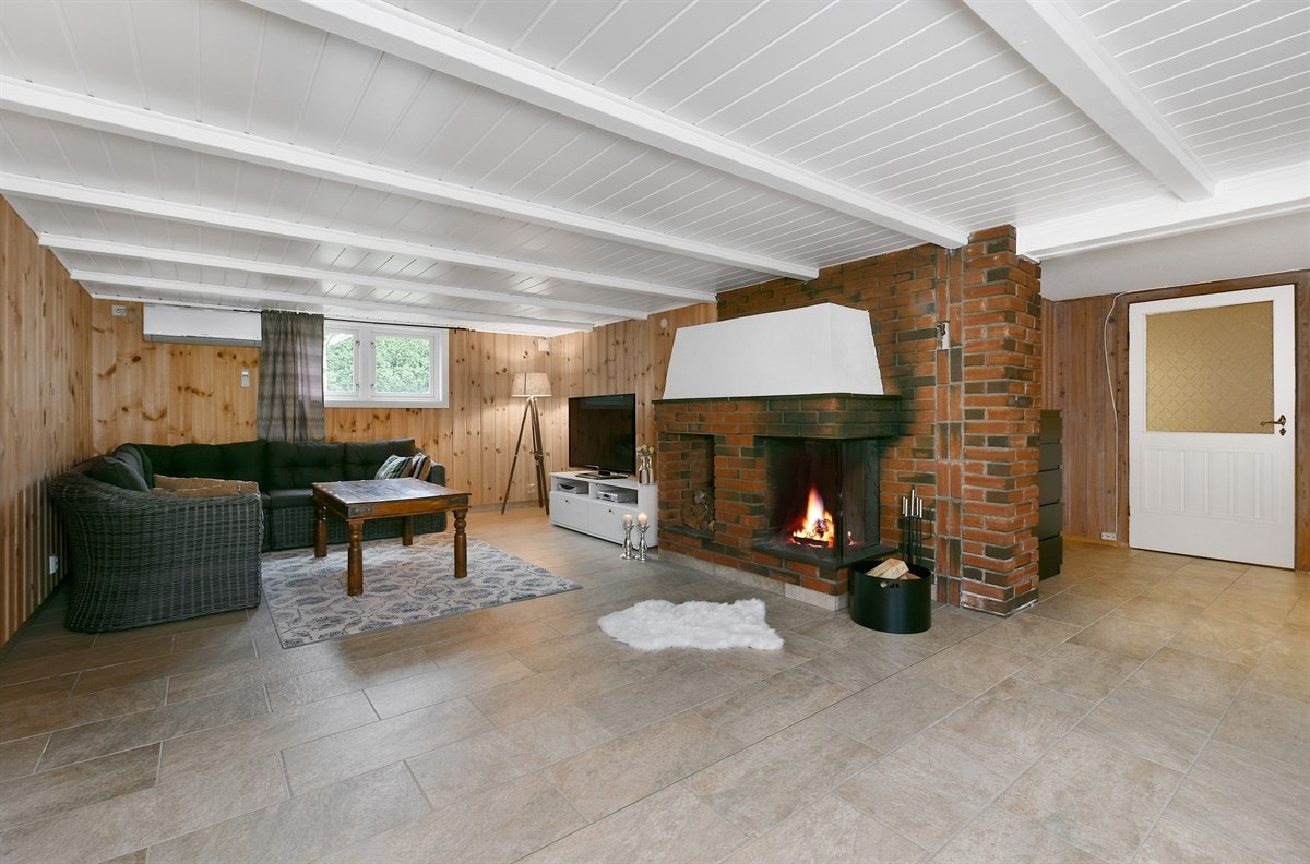 Stuen gir mulighet for ekstra privatliv i hverdagen, og er dessuten et hyggelig sted å trekke seg tilbake for sosialisering med venner og familie. Galleribilde