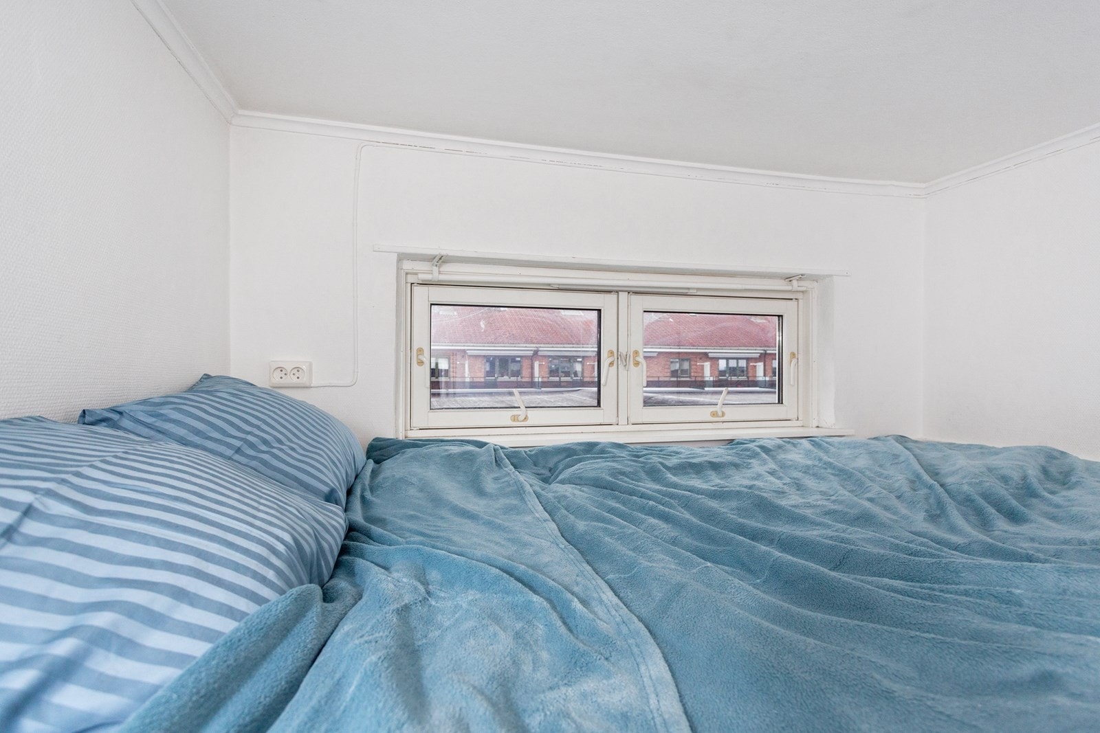 Behagelig med vindu i alkoven. Galleribilde