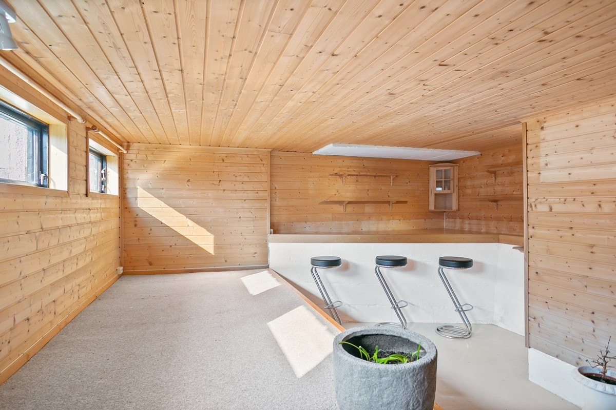 Rom i underetasjen med inngang fra østsiden til boligen Galleribilde