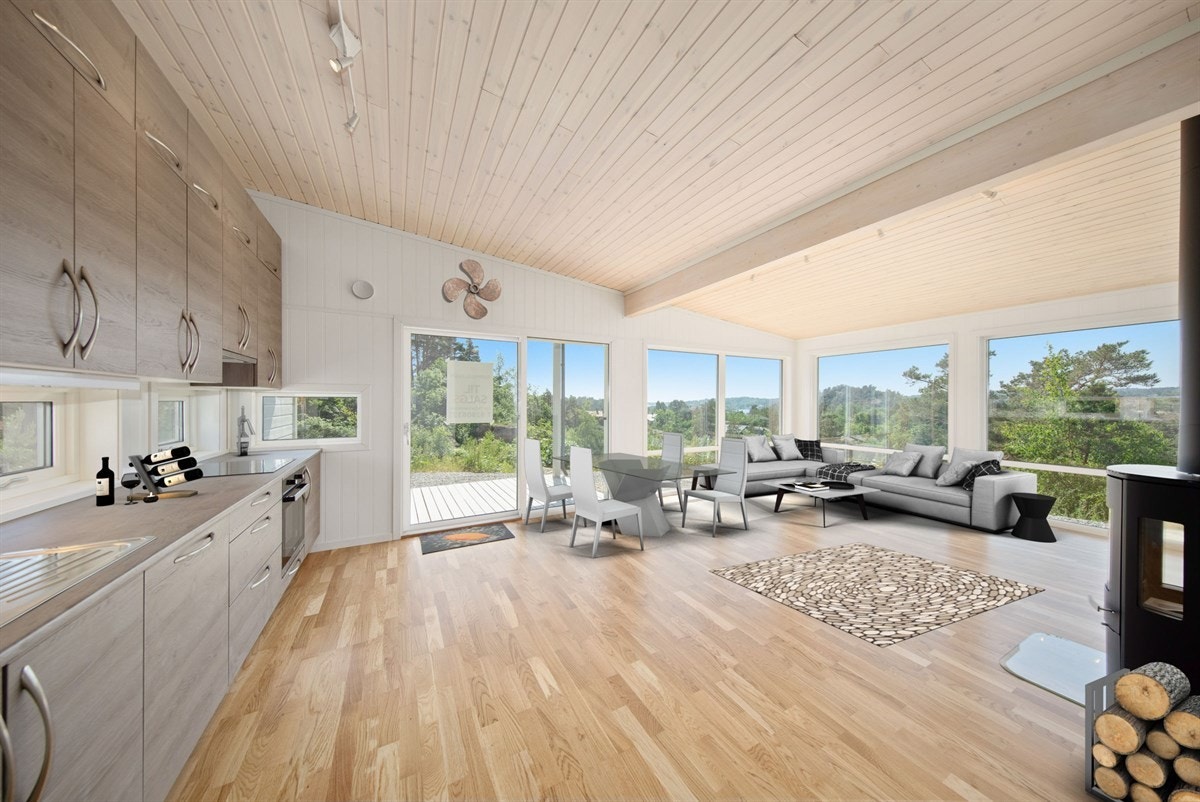 Stue og kjøkken i åpen løsning - illustrert med møbler Galleribilde