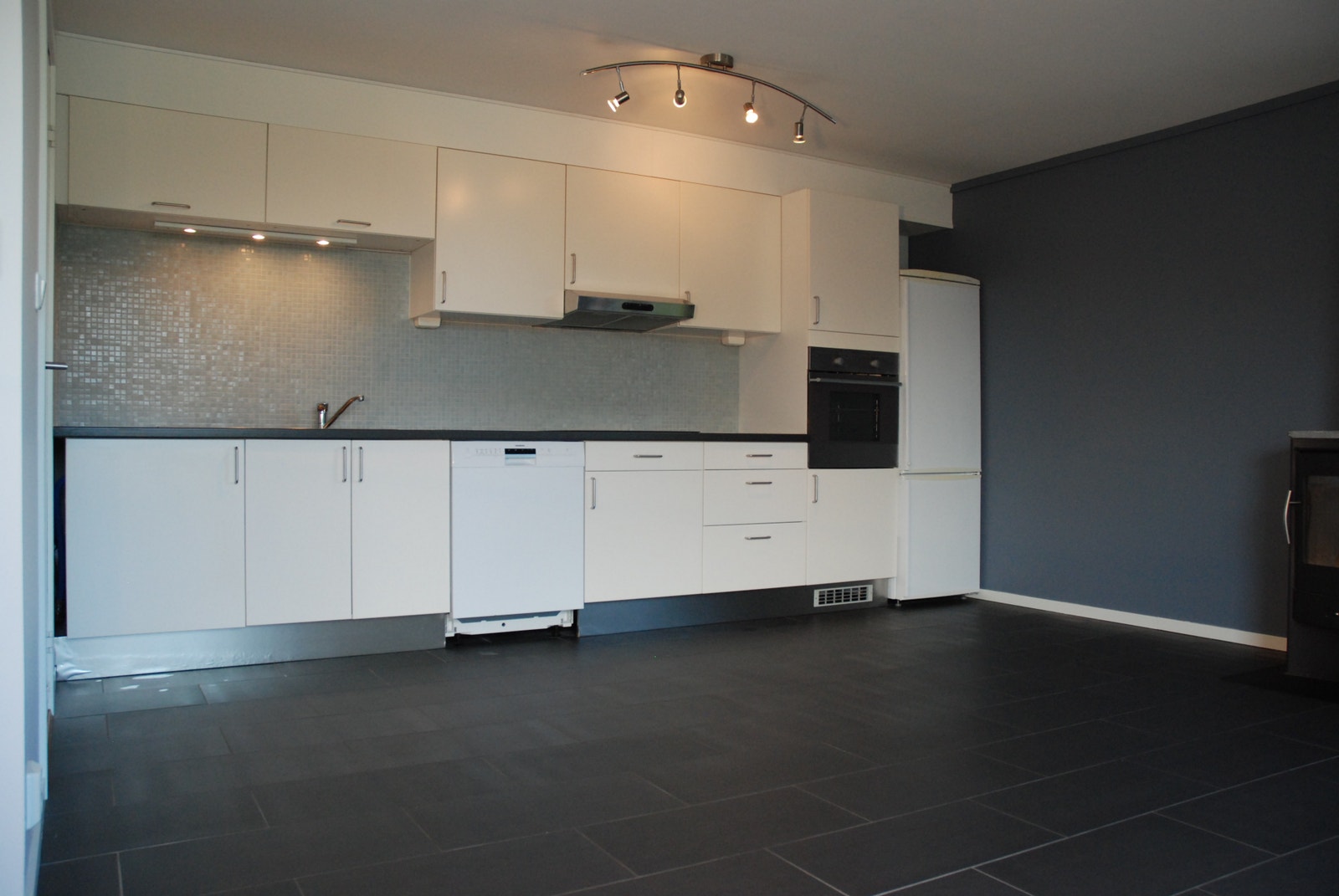 Kjøkken og stue i ett Galleribilde