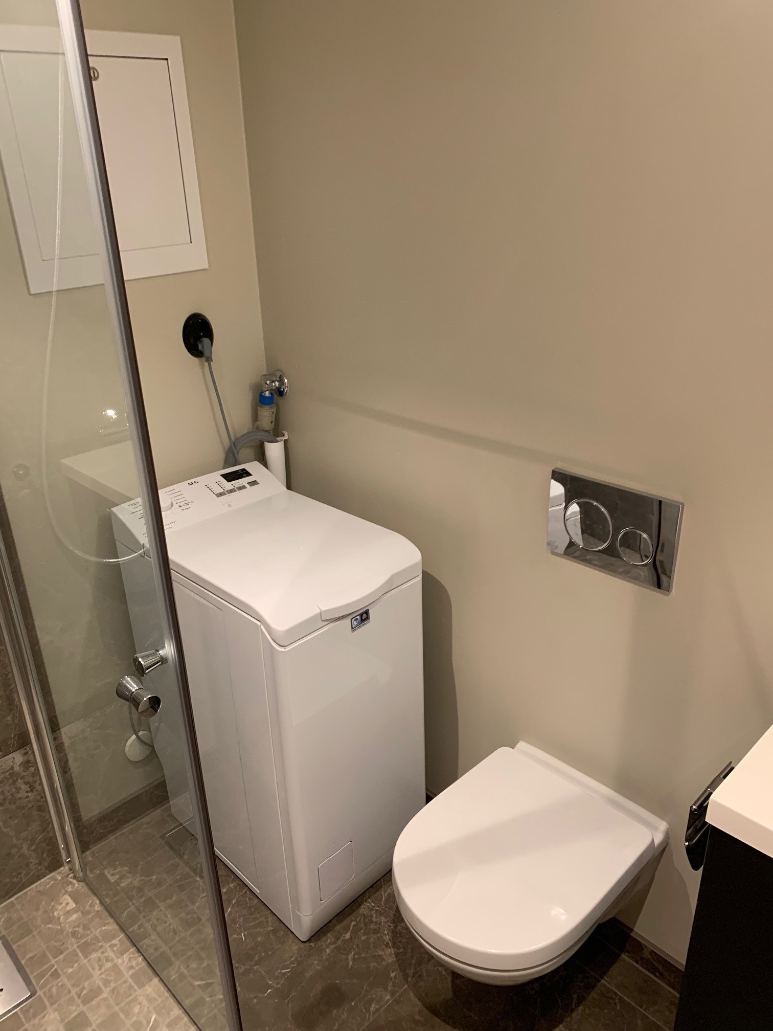 bad med vaskemaskin Galleribilde