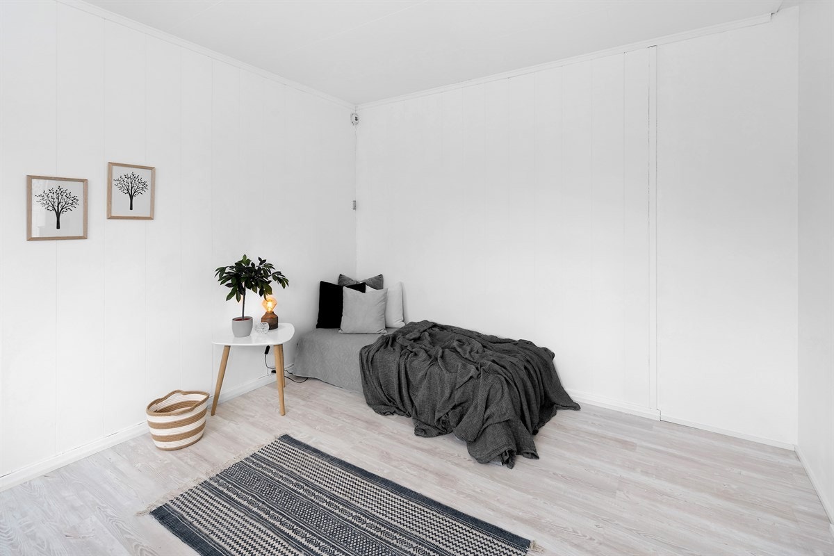 Spisestuen i første etasje er i bruk som et tredje soverom. Galleribilde