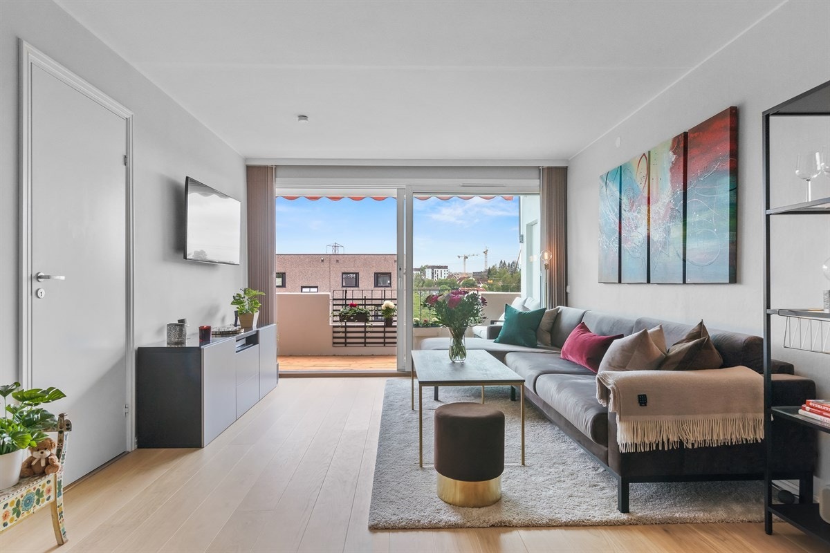 Hyggelig del av stuen for tv - og sofagruppe. Galleribilde