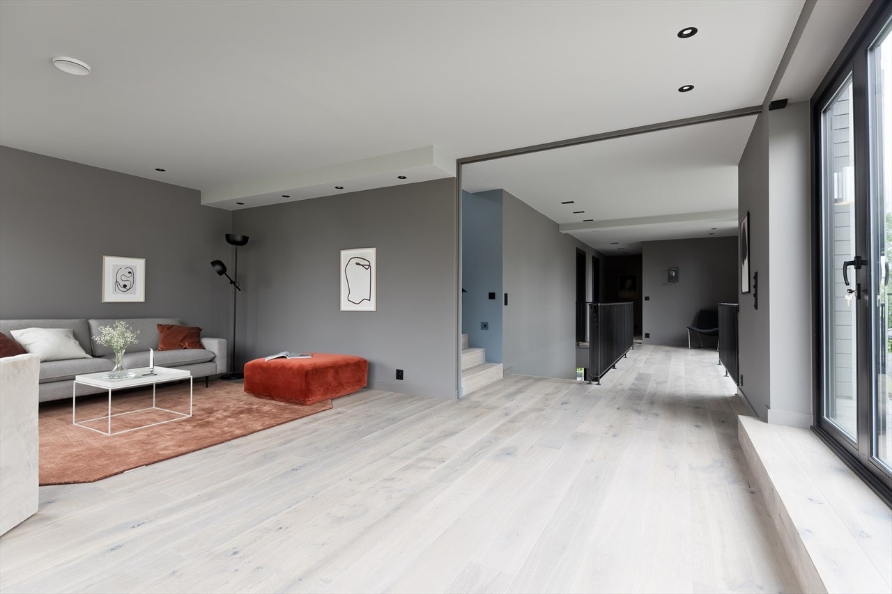 Direkte utgang til stor takterrasse - Her kan hele glassveggen åpnes helt opp mellom stuen og takterrassen. Galleribilde