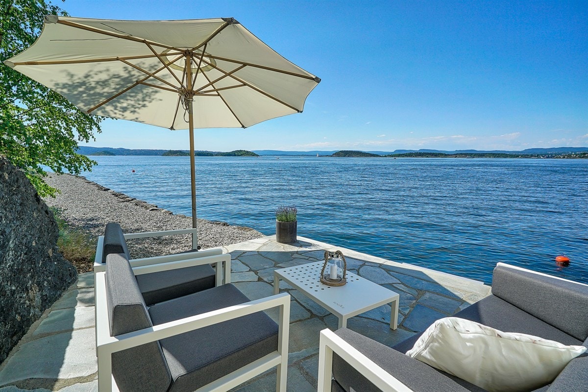 Lang privat strandlinje Galleribilde