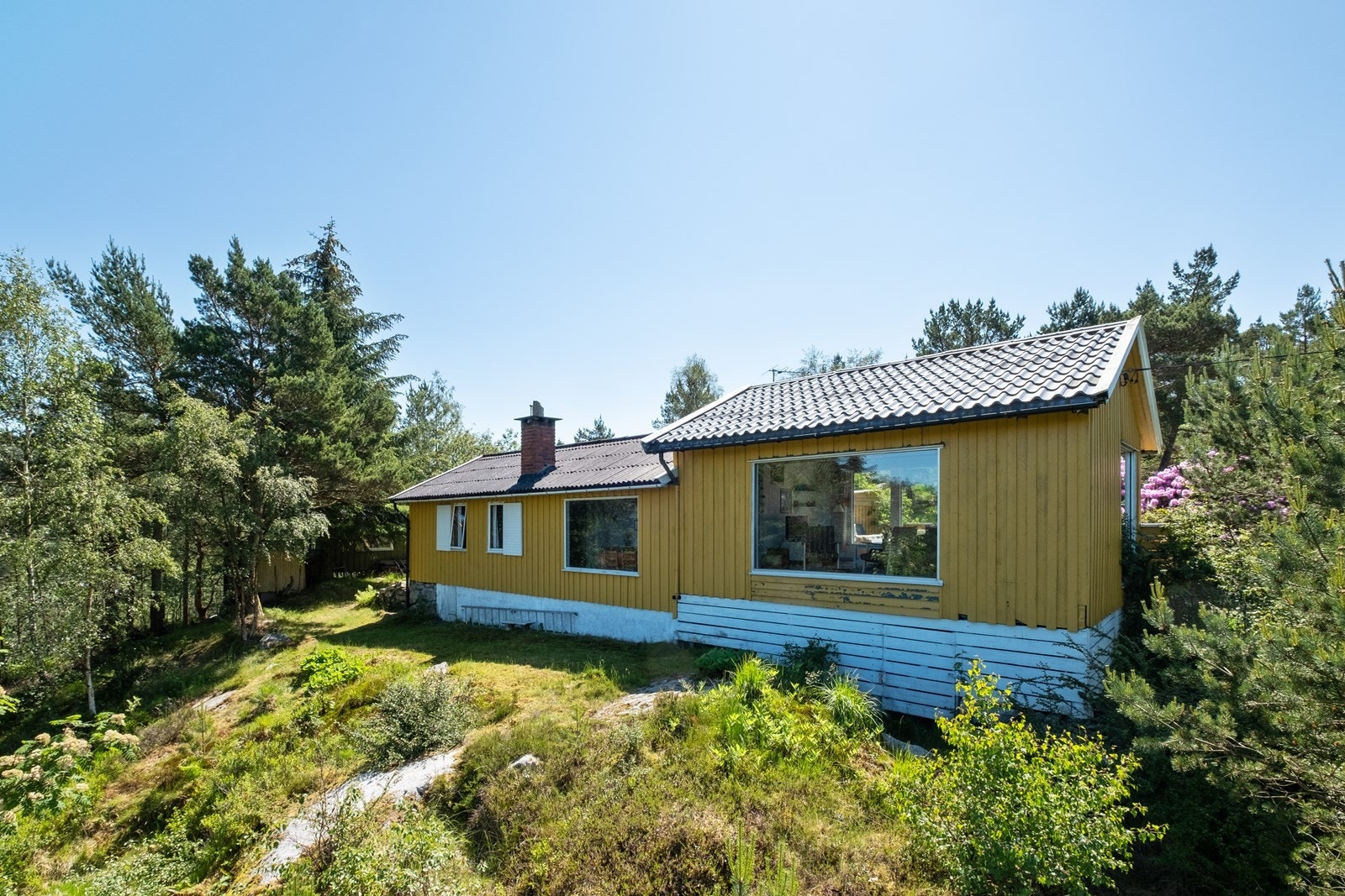 Hyttens fremside. Galleribilde