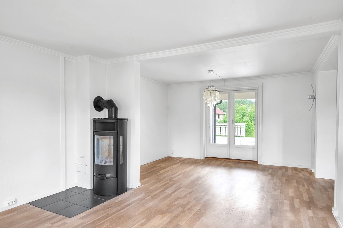 Spisestue med vedovn fra ca. år 2015 Galleribilde