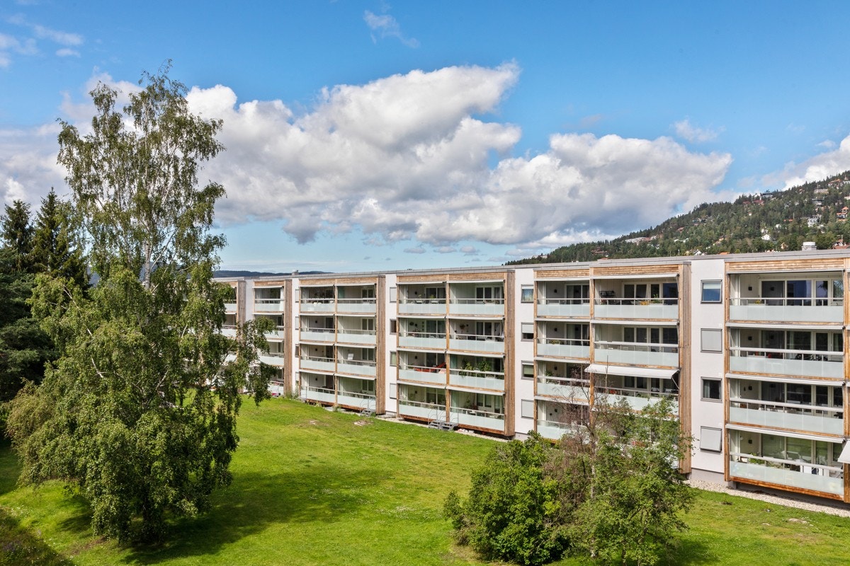 Utsikt fra balkong - Borettslaget har flere tilbud/aktiviteter og fellesrom for sine beboere Galleribilde