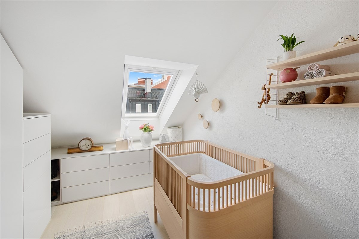 Et lyst og luftig soverom Galleribilde