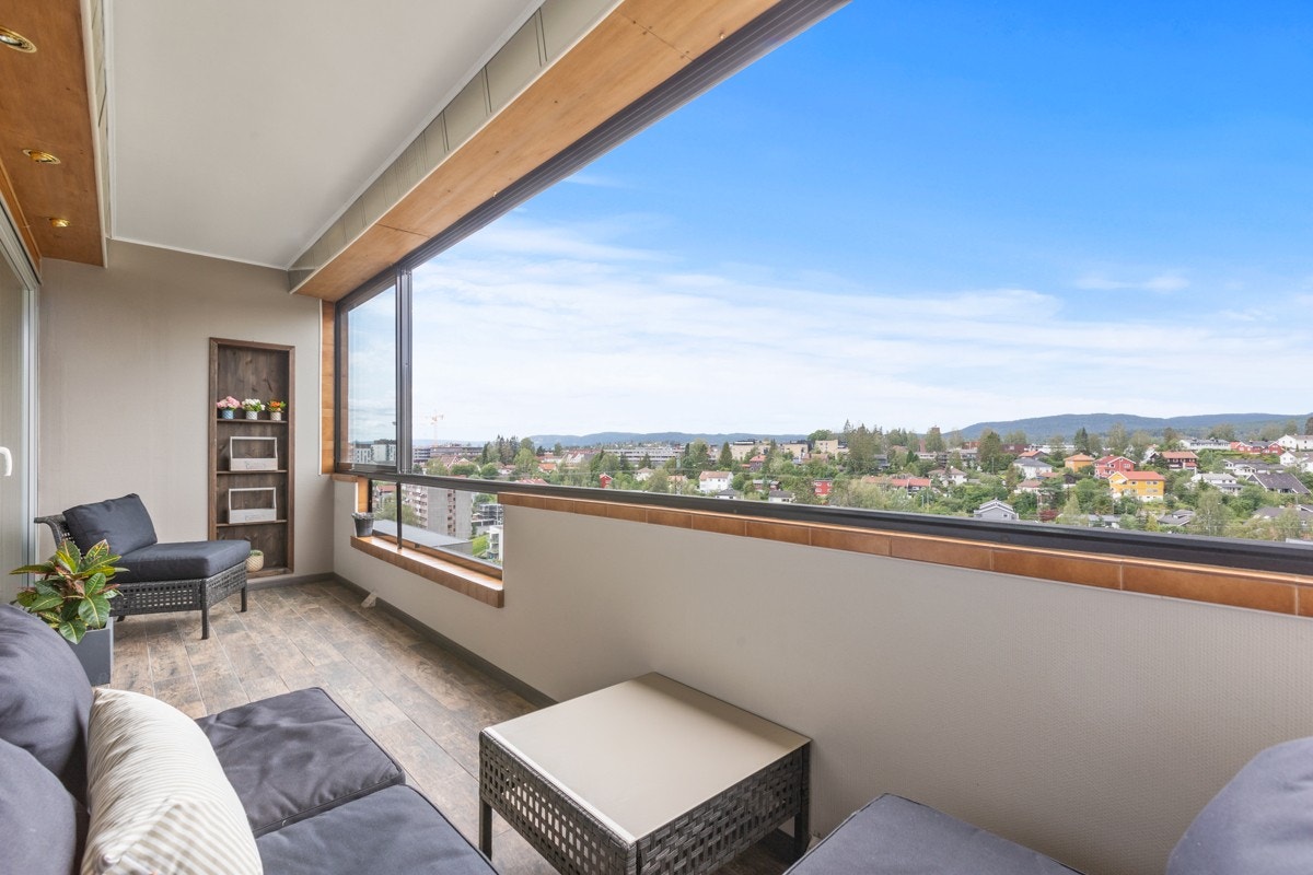 Balkong med gulvvarme og motorisert markise Galleribilde