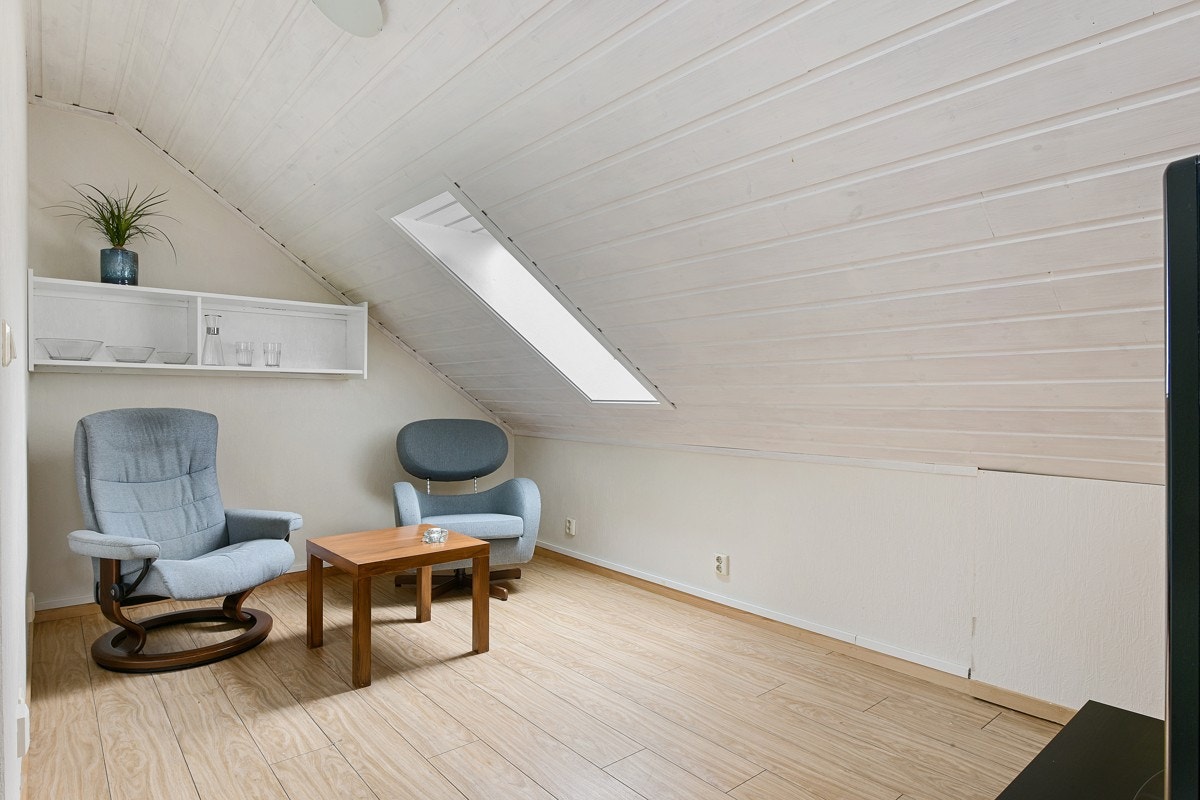 Innredet rom i tredje etasje som er innredet som loftstue. Galleribilde