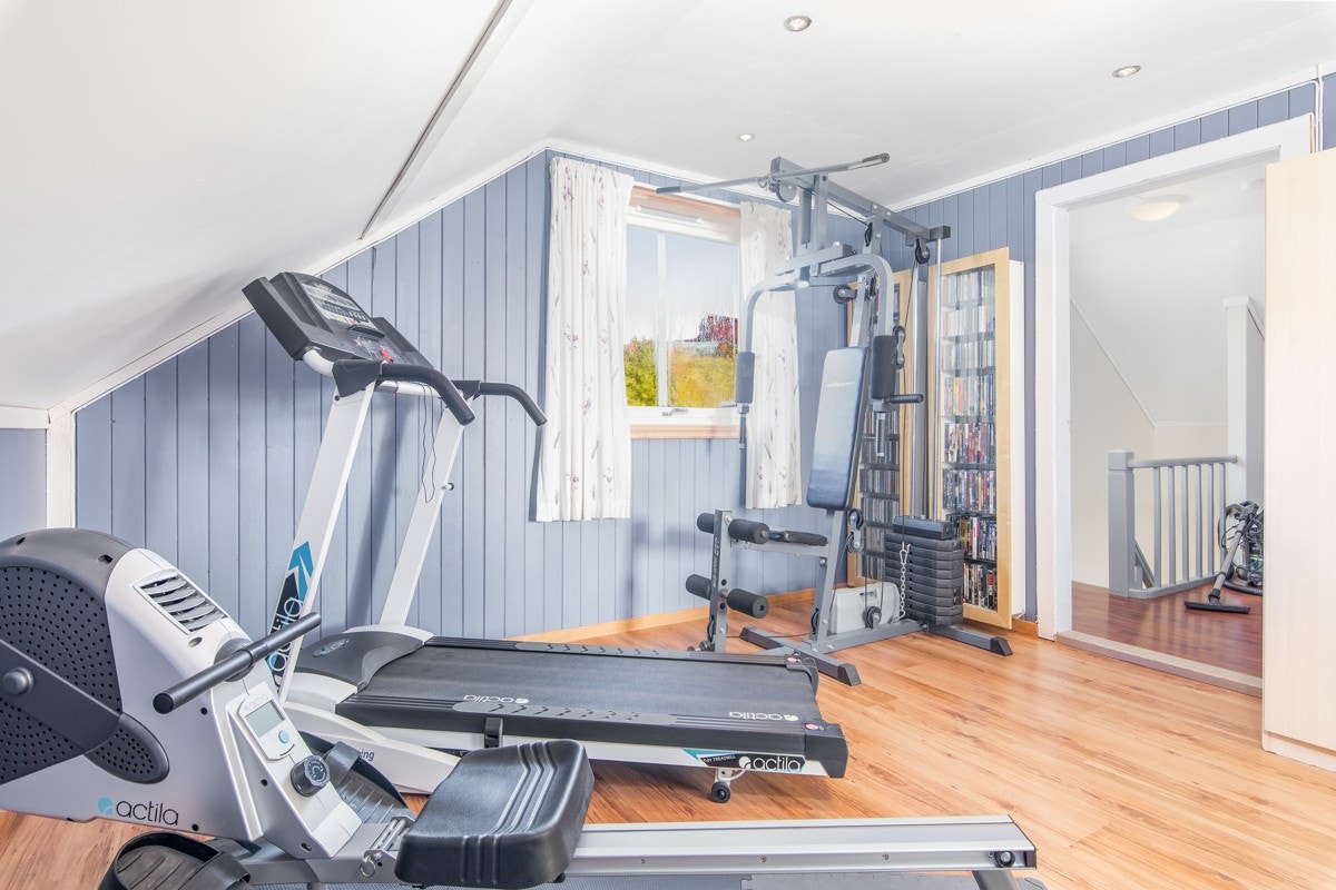 Det minste soverommet er malt i en delikat blåtone. Galleribilde